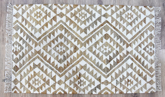 Patterned rug with geometric design on a wooden floor