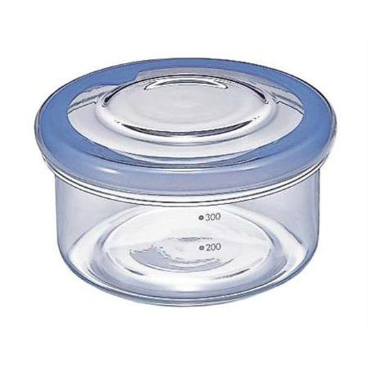 Hario Cycle Ware 17oz round glass container with airtight lid. Heat-resistant Japanese glass. Perfect for food storage & meal prep. Made in Japan.