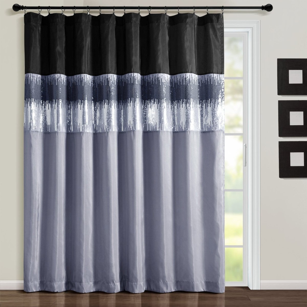 Black and gray striped curtain in a room with a window and wall art. Shimmery and sparkly sequins curtain panel.