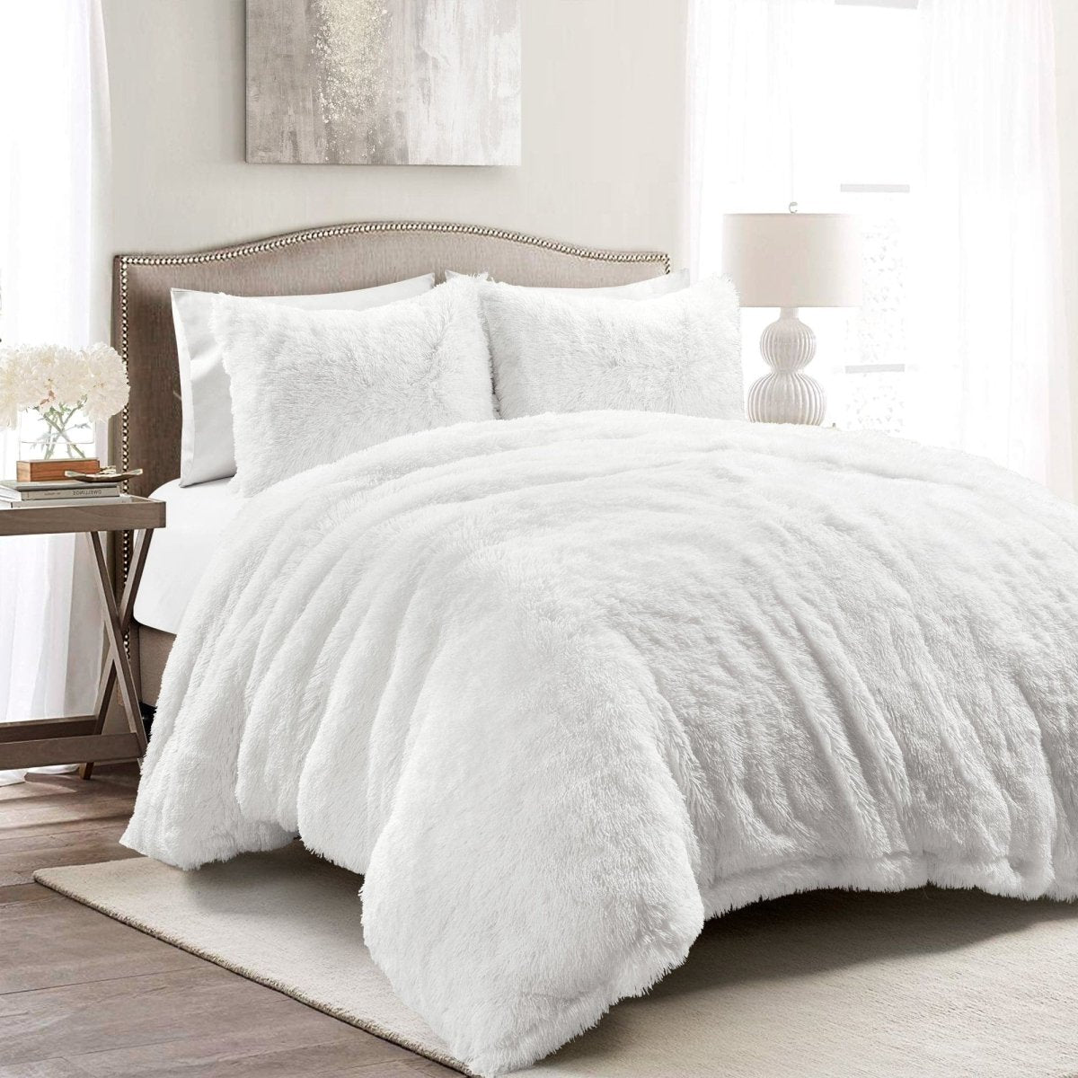 White textured comforter on a bed in a bright bedroom setting. Faux fur bedding, duvet cover set, luxury bedding, bed set decor, LushDecor