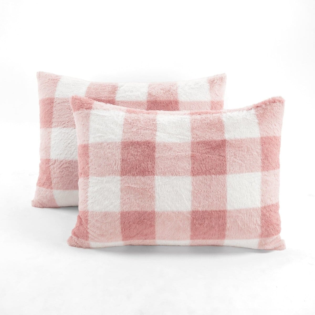 Two pink and white checkered pillows on a white background.Faux fur checkered comforter bed set plaid bedding.
