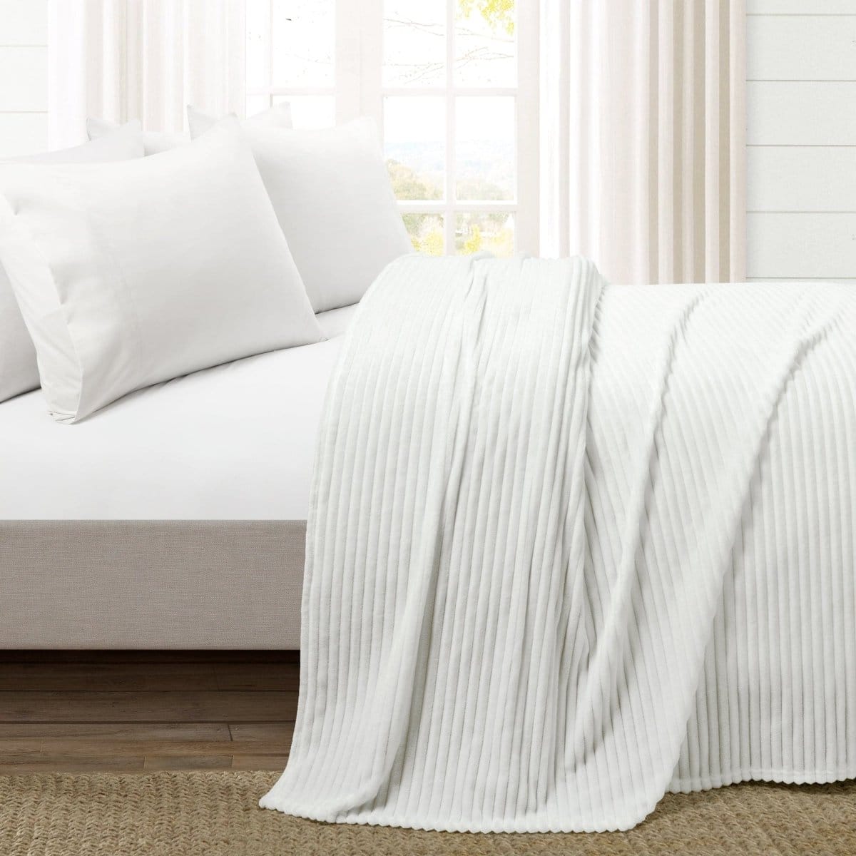 Wrap Yourself in Luxurious Comfort
Discover the ultimate in cozy relaxation with the Ribbed Faux Fur Oversized Blanket by LushDecor