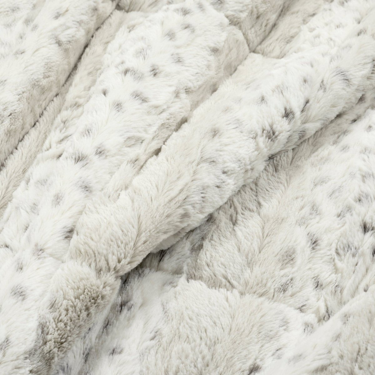 Subtle Leopard faux fur in color block stripe. 3-piece set includes comforter & 2 shams. Bold contemporary style by LushDecor.