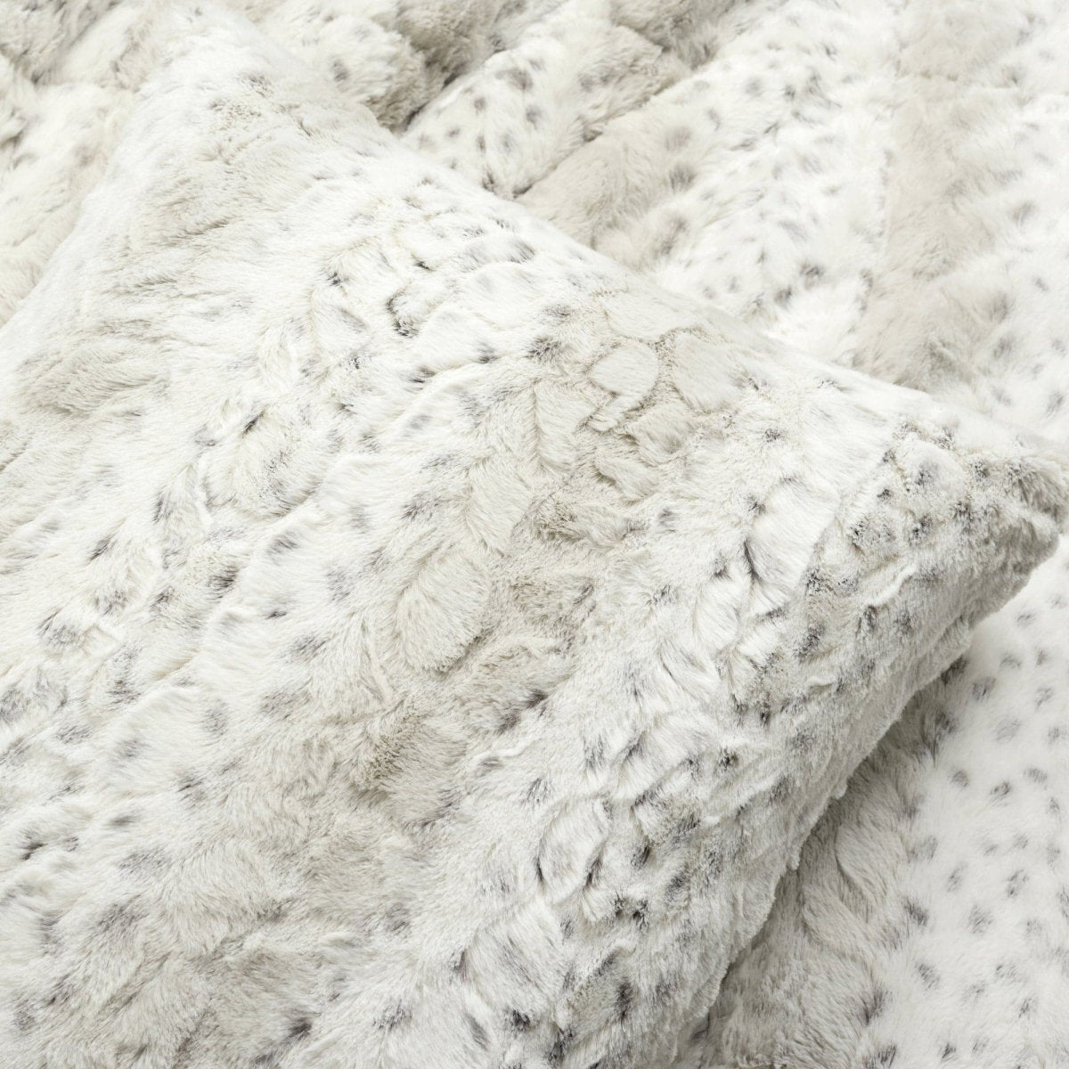 Leopard faux fur in color block stripe bedding