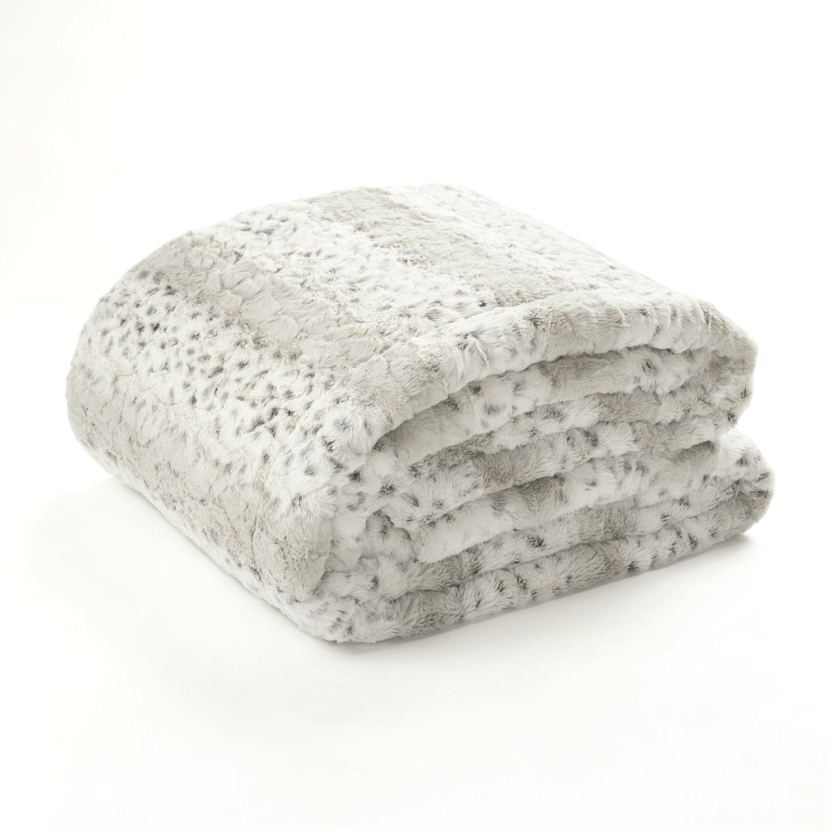 Folded gray textured blanket on a white background. Leopard faux fur in color block stripe bedding