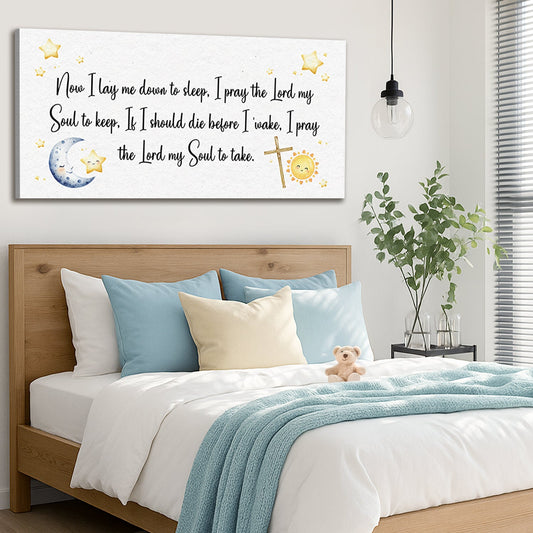 Lay Me Down to Sleep canvas wall art from Tailored Canvases. Black script lettering sits on a white background, surrounded by yellow stars, a blue crescent moon, a smiling sun, and a cross.