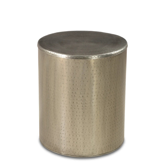 Metallic cylindrical side table on a white background