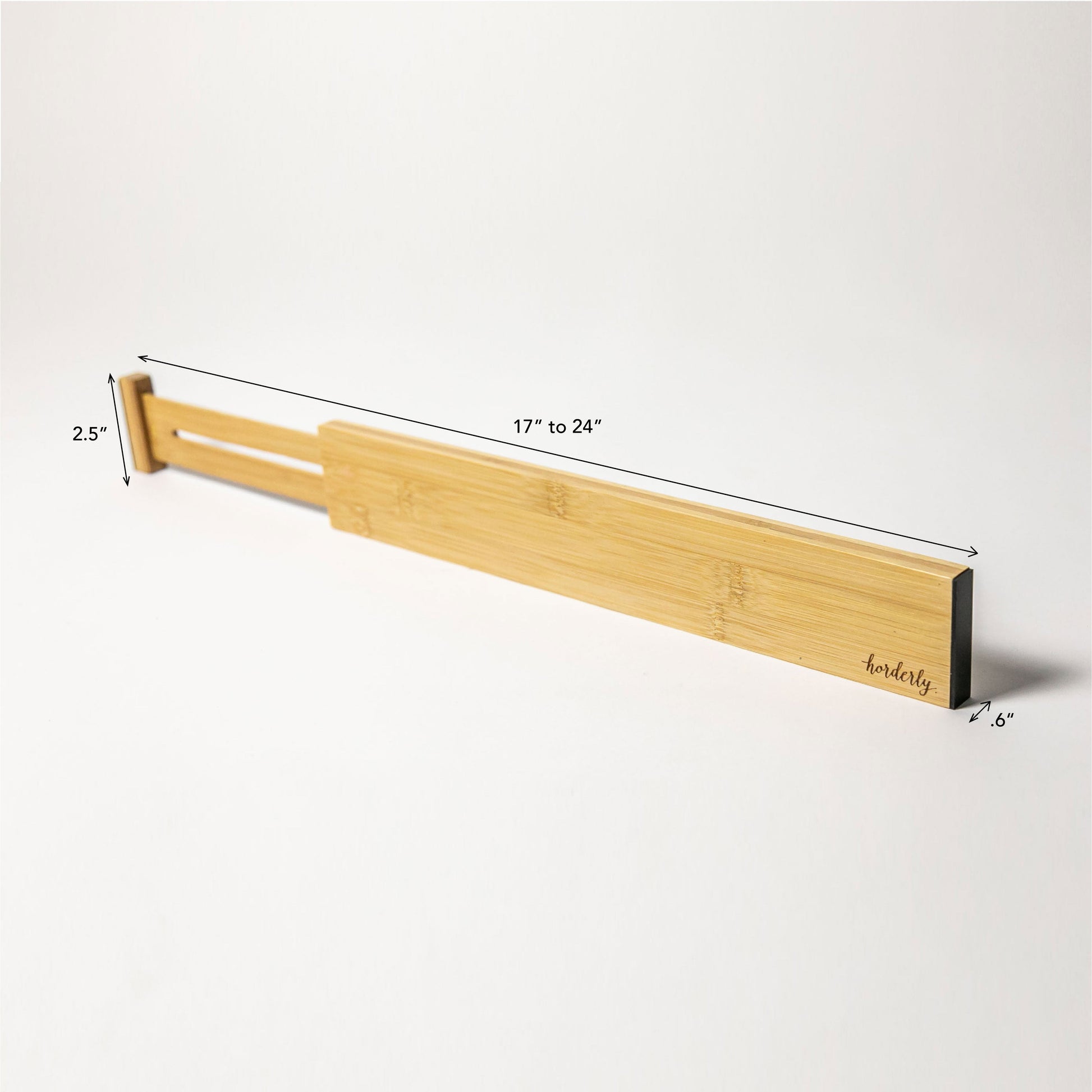 Bamboo drawer organizer with dimensions on a white background