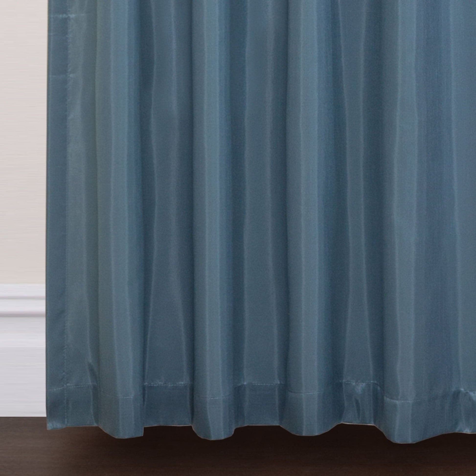 Blue curtain with a neutral background