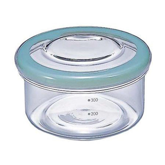 Hario Cycle Ware 17oz round glass container with airtight lid. Heat-resistant Japanese glass. Perfect for food storage & meal prep. Made in Japan.