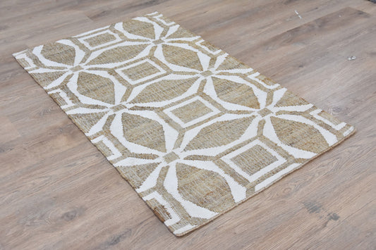 Patterned rug on a wooden floor