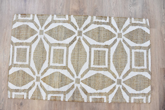 Patterned rug with geometric design on a wooden floor