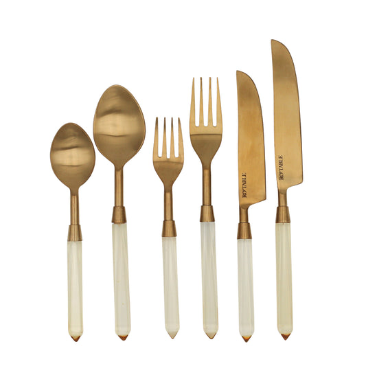 24-piece buttercream yellow cutlery set with gold-toned stainless steel. Service for 4 with luminous handles. Perfect for entertaining.