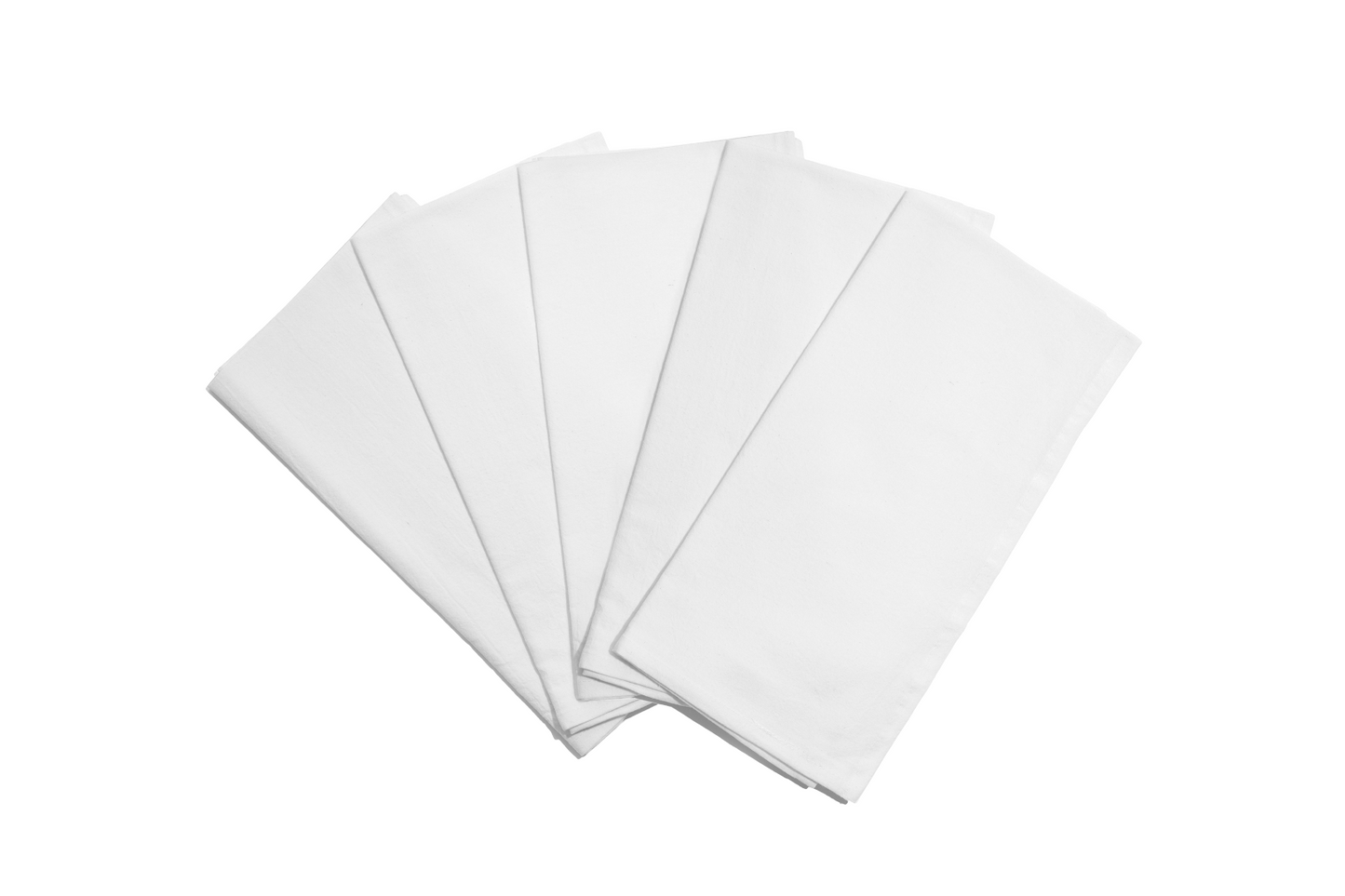 Five white napkins stacked on a white background