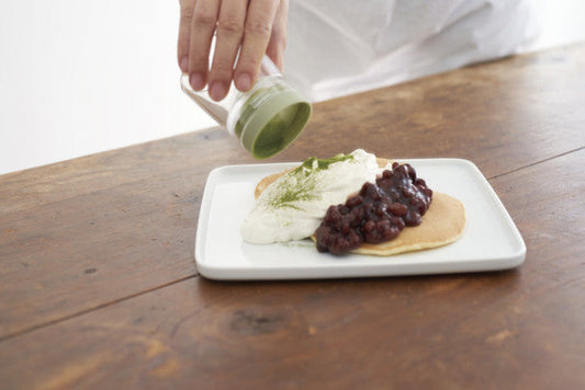 Hario Chaco tea grinder with mesh sifter. Create fine matcha powder from loose tea leaves. BPA-free Japanese design. Perfect for tea enthusiasts.