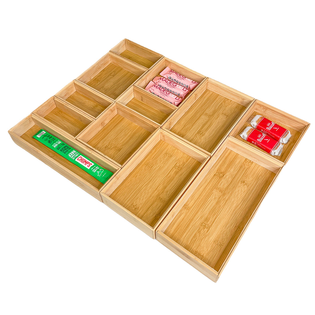 Bamboo Stackable Drawer Organizer system. This sustainable and beautiful solution makes any kitchen drawer look custom-built, with adjustable pieces that fit your exact needs.
