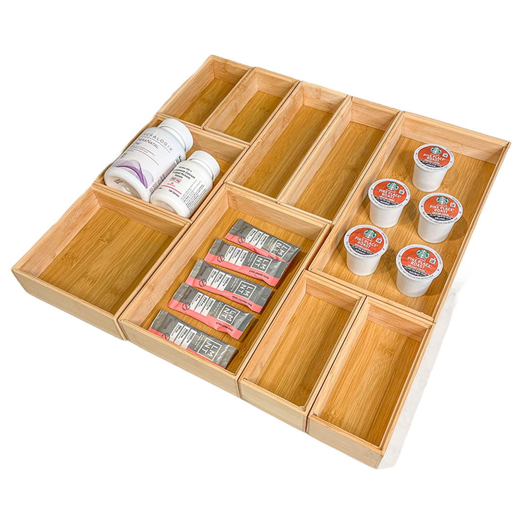 Bamboo Stackable Drawer Organizer system. This sustainable and beautiful solution makes any kitchen drawer look custom-built, with adjustable pieces that fit your exact needs.
