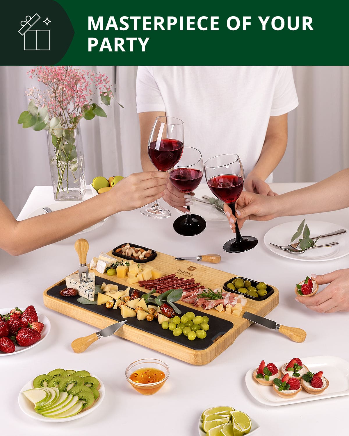 Enjoying a party with wine and a charcuterie board.