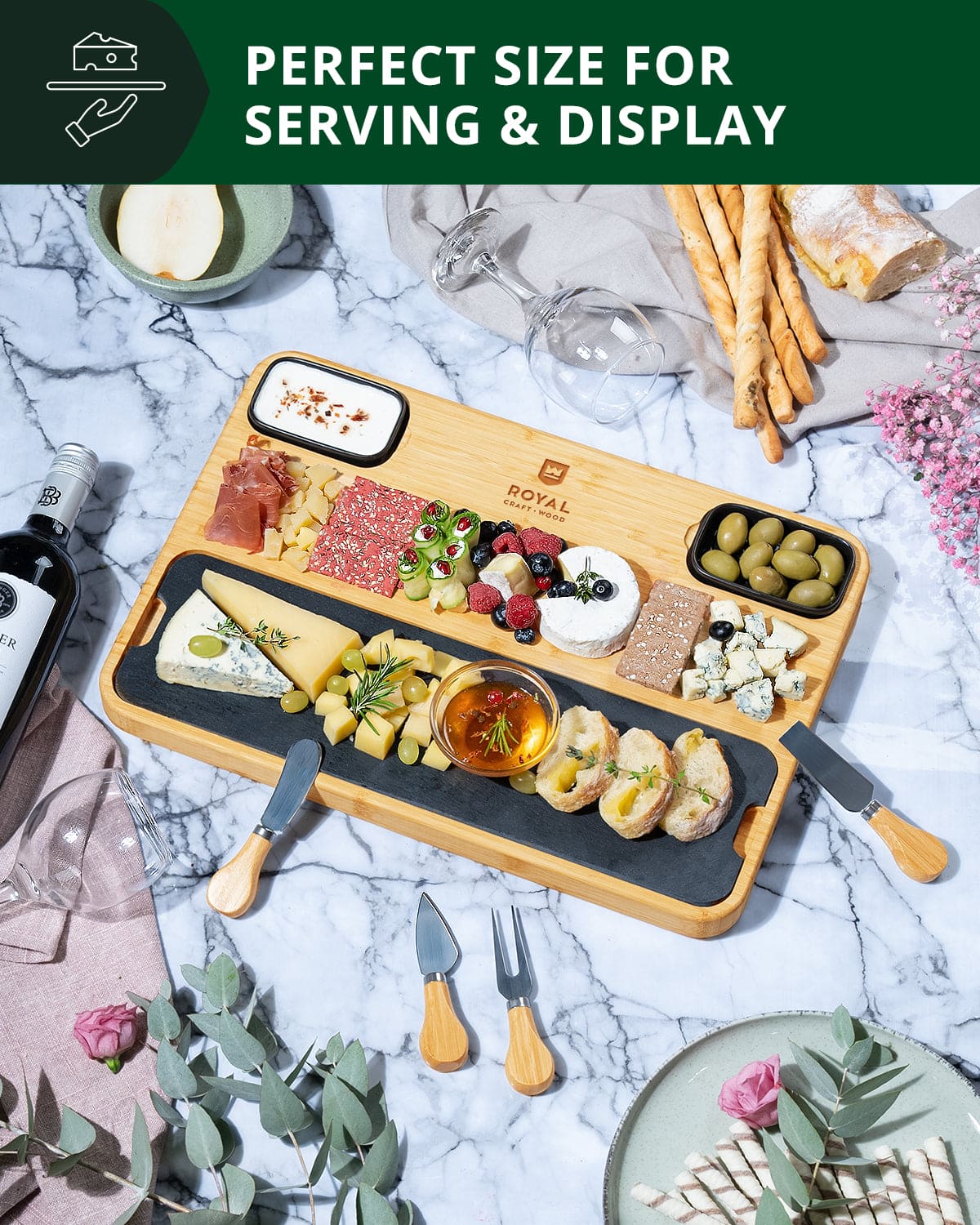 Elegant cheese board with slate plate and 4 piece cutlery set. Perfect for entertaining. Premium quality serving platter for charcuterie, appetizers & wine nights. Shop now.