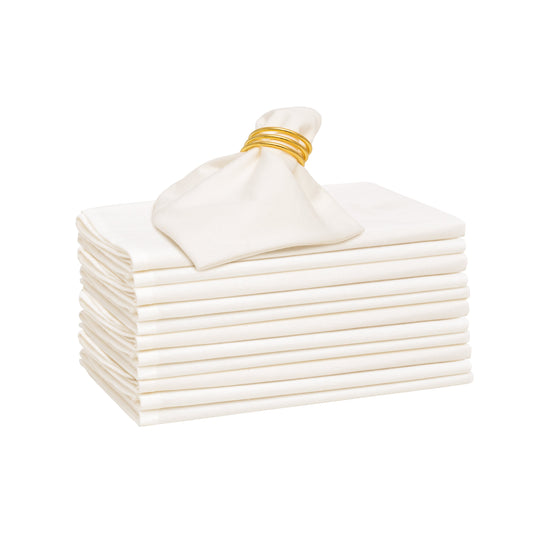 Stack of white napkins with a gold ring on a white background