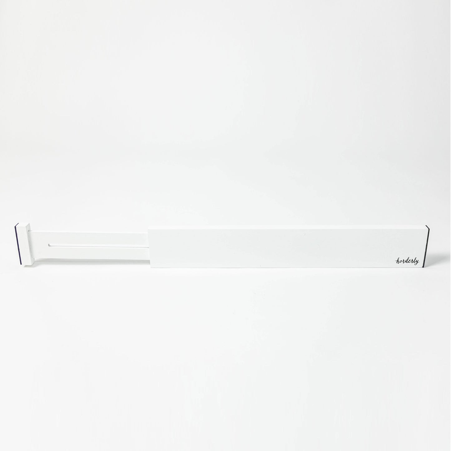 White rectangular expandable bamboo drawer separator with horderly branding on a white background