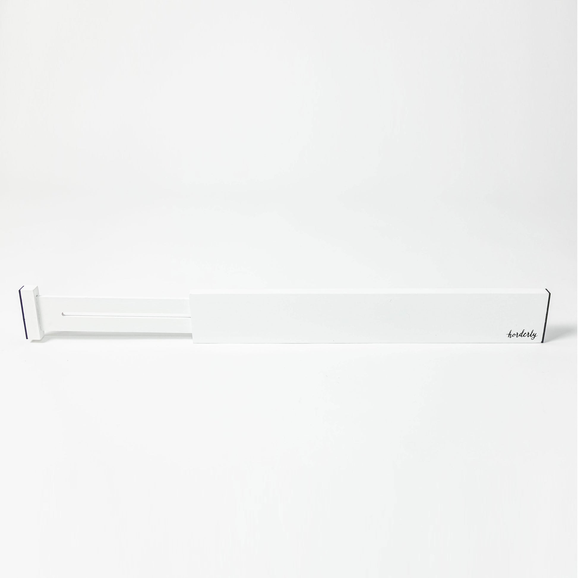 White rectangular expandable bamboo drawer separator with horderly branding on a white background
