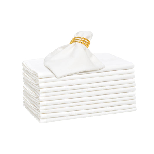 Stack of white napkins with a gold ring on a white background