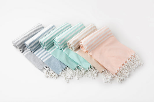 Premium Turkish beach towels that are lightweight, quick-drying, and ultra-absorbent. Perfect for beach, pool, travel, and bath. Soft cotton construction with beautiful designs!